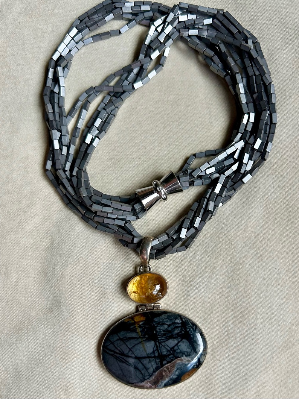 Multi-Strand Pyrite Necklace with Picasso Jasper and Amber Pendant